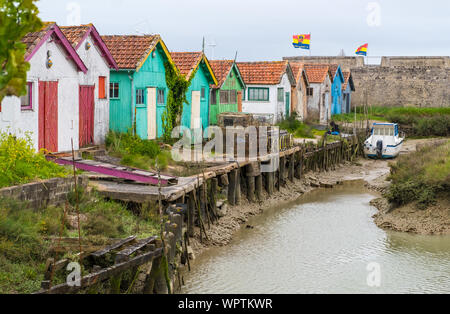 Ile d'Oleron, France - May 10, 2019: Colorful huts of fishermen in Le Chateau-d'Oleron on Ile d'Oleron in France Stock Photo