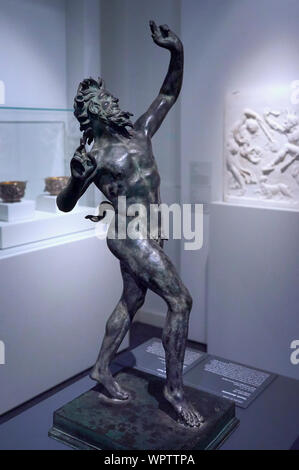 Dancing Faun, cast in bronze, stone, 1st century B.C. found in Villa de los Papyri, Herculaneum, national archaeological museum of Naples Stock Photo