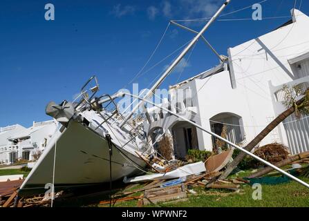 Treasure Cay, ABACO, BAHAMAS. 9th Sep, 2019. A large sailboat sits grounded in the back yard of a condo in the resort community city of Treature Cay on Abaco Island in the Bahamas on Monday. The area was hard hit by hurricane Dorian. Credit: Robin Loznak/ZUMA Wire/Alamy Live News Stock Photo