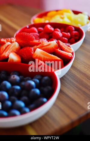 Close-up Of Assorted Fruits In Bowls