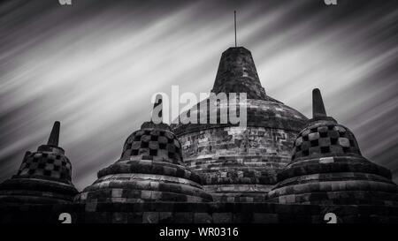 Low Angle View Of Borobudur Temple Against Cloudy Sky