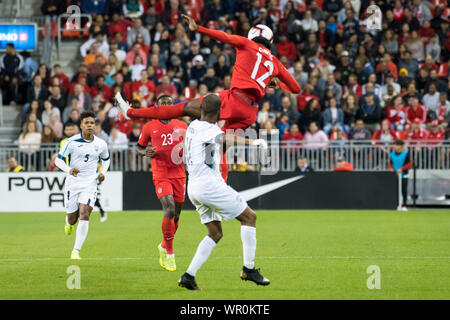 Yordan Santa Cruz 11 and Alphonso Davies 12 are seen in action