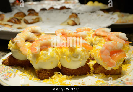 Pintxos served on the bar of a popular pintxo bar in San Sebastian, Basque country, Spain. Stock Photo