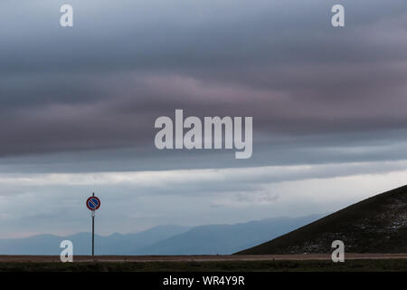 Road sign against a moody sky background with big clouds Stock Photo ...