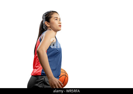 Female Asian Athlete In Sports Attire Over White Background Stock