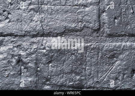Gray shiny concrete background. Foil pattern. Grey rough painted wall. Grunge wall reflective of raggy surface. Texture of metallic gloss. Shiny paint Stock Photo