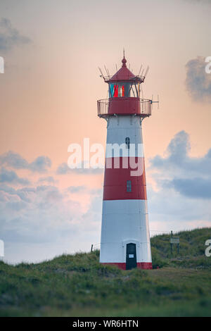 Beautiful Lighthouse List-Ost in sunset light - A Lighthouse on the island Sylt, Germany Stock Photo