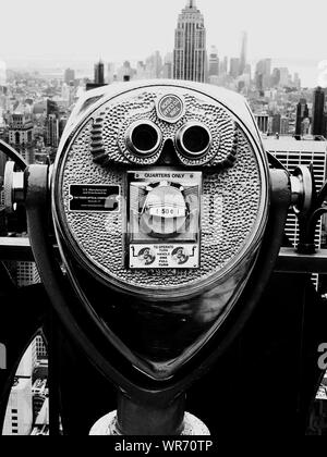 Close-up Of Coin-operated Binoculars Against Empire State Building