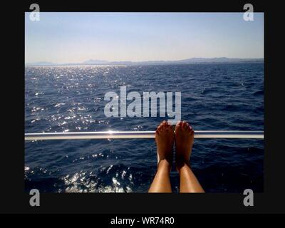 Topless Woman Sunbathing On A Boat Stock Photo Alamy