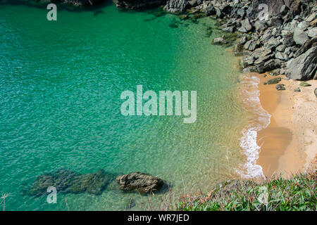 Beautiful aqua sea and beach along the Jurassic coast in Devon Stock Photo