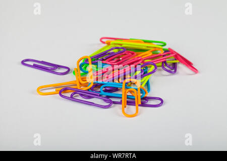 Picture of colorful paperclips on white background Stock Photo