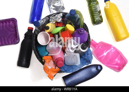 trash can full of plastics such as bottles, bags ... Stock Photo
