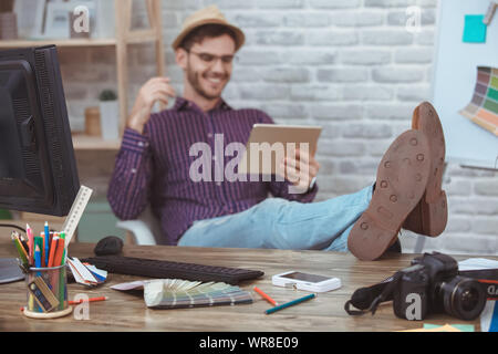 Graphic designer small business home office concept break time playing Stock Photo