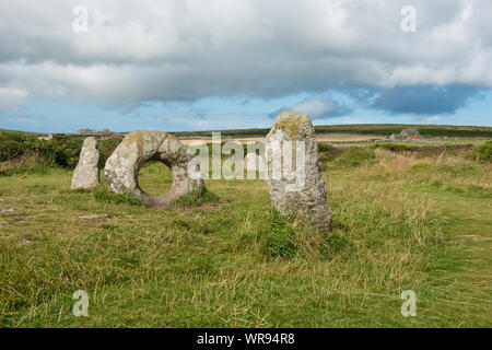 Men-an-Tol (holed stone) archeological megalith and standing stones. Cornwall, England, UK Stock Photo