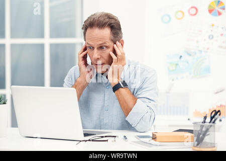 Senior stylish business man in the ofiice Stock Photo