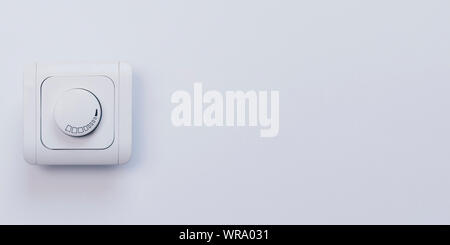 Dimmer Light Switch. Electrician switch. White rolling electricity switch on a bright wall Stock Photo