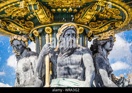Close up of the Fountain of River Commerce and Navigation in Place de la Concorde in the center of Paris France, on a summer day, with drops of water Stock Photo
