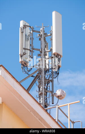 Detailed view of the mobile terrestrial telecommunications repeater antenna equipped with the latest 4G and 5G technologies Stock Photo