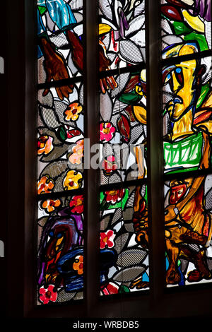 10 September 2019, Bavaria, Bamberg: The sun shines through the window of the painter and sculptor Lüpertz in the St. Elisabeth Church in Bamberg. The first of a total of eight windows with the title 'The old woman - giving alms' was previously uncooled. It shows, like the following windows, a scene from the life of Saint Elisabeth Photo: Daniel Karmann/dpa Stock Photo