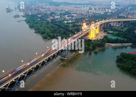 An aerial view at night of the Nanjing Yangtze River Bridge over the Yangtse River in Nanjing City, east China's Jiangsu Province, July 21st, 2019. Stock Photo