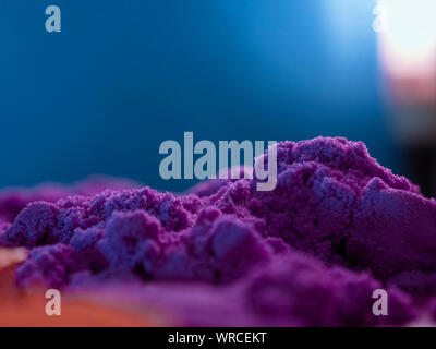 Macro photo of purple color sand. abstract landscape. Stock Photo