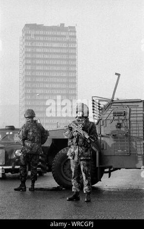 Soldiers from the 1st Battalion, Queen's Own Highlanders army regiment, on patrol in West Belfast, Northern Ireland, in December 1992.