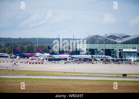 Low cost airline Ryanair aircraft Boeing 737-800 and low cost airline Wizz Air Airbus A320-200 in Gdansk Lech Walesa Airport in Gdansk, Poland. Septem Stock Photo