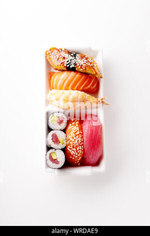 Creative layout with various sushi on white background. Shrimp, eel, salmon and tuna Stock Photo