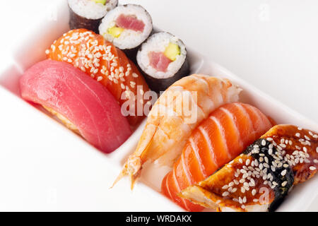 Creative layout with various sushi on white background. Shrimp, eel, salmon and tuna Stock Photo