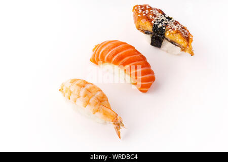 Creative layout with various sushi on white background. Shrimp, eel, salmon. Stock Photo
