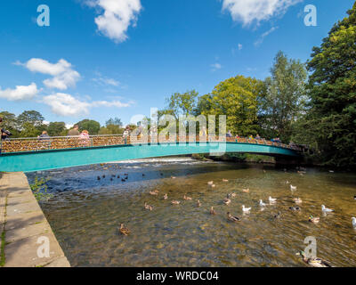 Weir bridge covered in 'love locks', over the river Wye in Bakewell, a market town and civil parish in the Derbyshire Dales district of Derbyshire, UK Stock Photo