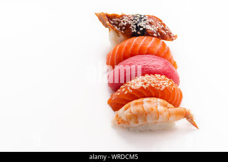 Creative layout with various sushi with eel, shrimp, salmon and tuna  on white background Stock Photo