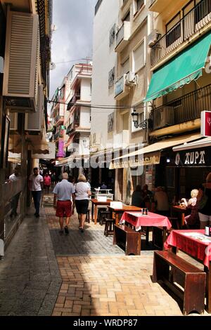 Benidorm, Alicante, Spain- September 7, 2019: Bar of typical spanish food full of people in the old town of Benidorm Stock Photo