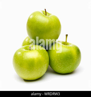 Apples, white background. Four green apples pile Stock Photo