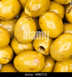Green olives, overhead view, close up Stock Photo