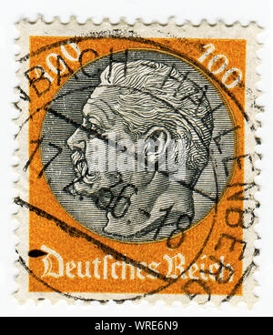 GERMANY - CIRCA 1933: A 100pf stamp printed in Germany  of President Hindenburg in new value, circa 1933 Stock Photo