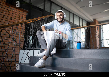 Cheerful man feeling excited before having lunch Stock Photo