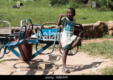 Ugandan boy in a park Stock Photo