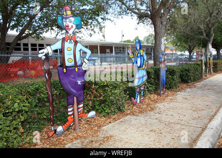 Shook Yard fence posters with creative design at Town of Murals, Lake Placid in Florida,USA Stock Photo