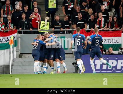 BUDAPEST, HUNGARY - SEPTEMBER 9: Stanislav Lobotka of Slovakia #22, Juraj Kucka of Slovakia #19, Milan Skriniar of Slovakia #14, Lubomir Satka of Slovakia #5 and Denis Vavro of Slovakia #3 celebrate during the 2020 UEFA European Championships group E qualifying match between Hungary and Slovakia at Groupama Arena on September 9, 2019 in Budapest, Hungary. Stock Photo