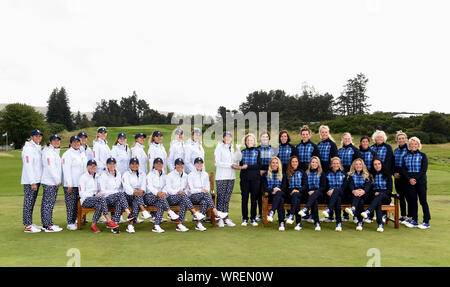 Team USA captain Juli Inkster (centre left) and Team Europe captain Catriona Matthew (centre right) pose with the trophy, vice captains and their team during preview day two of the 2019 Solheim Cup at Gleneagles Golf Club, Auchterarder. Stock Photo
