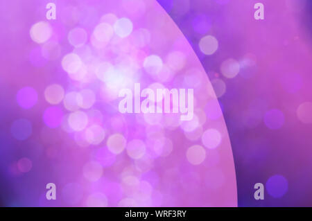 Pink and blue christmas lights abstract background with bokeh Stock Photo