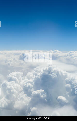Aerial view of beautiful sky with clouds and sun on a summer day. Time ...