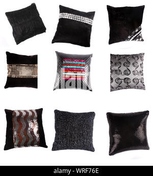 A set of luxurious pillows and cushions with beautiful designs, on white studio background. Stock Photo