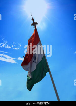 A beautiful view of the flag of India against the bright noon sun Stock Photo