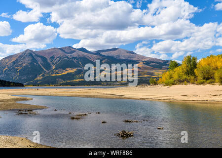 Autumn at Twin Lakes - A sunny autumn day view of Twin Lakes at base of two highest peaks, Mount Elbert and Mount Massive, of Rocky Mountains, CO, USA. Stock Photo