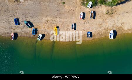 Aerial view of boats on the beach. Lokve lake in Croatia. Stock Photo