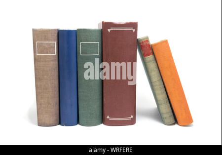 Stack of multi colored books isolated on white. Stock Photo