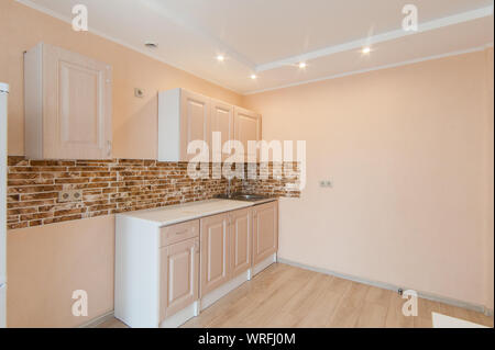Russia, Moscow- June 15, 2018: interior room apartment. standard repair decoration in hostel. kitchen and dining room Stock Photo