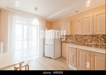 Russia, Moscow- June 15, 2018: interior room apartment. standard repair decoration in hostel. kitchen and dining room Stock Photo